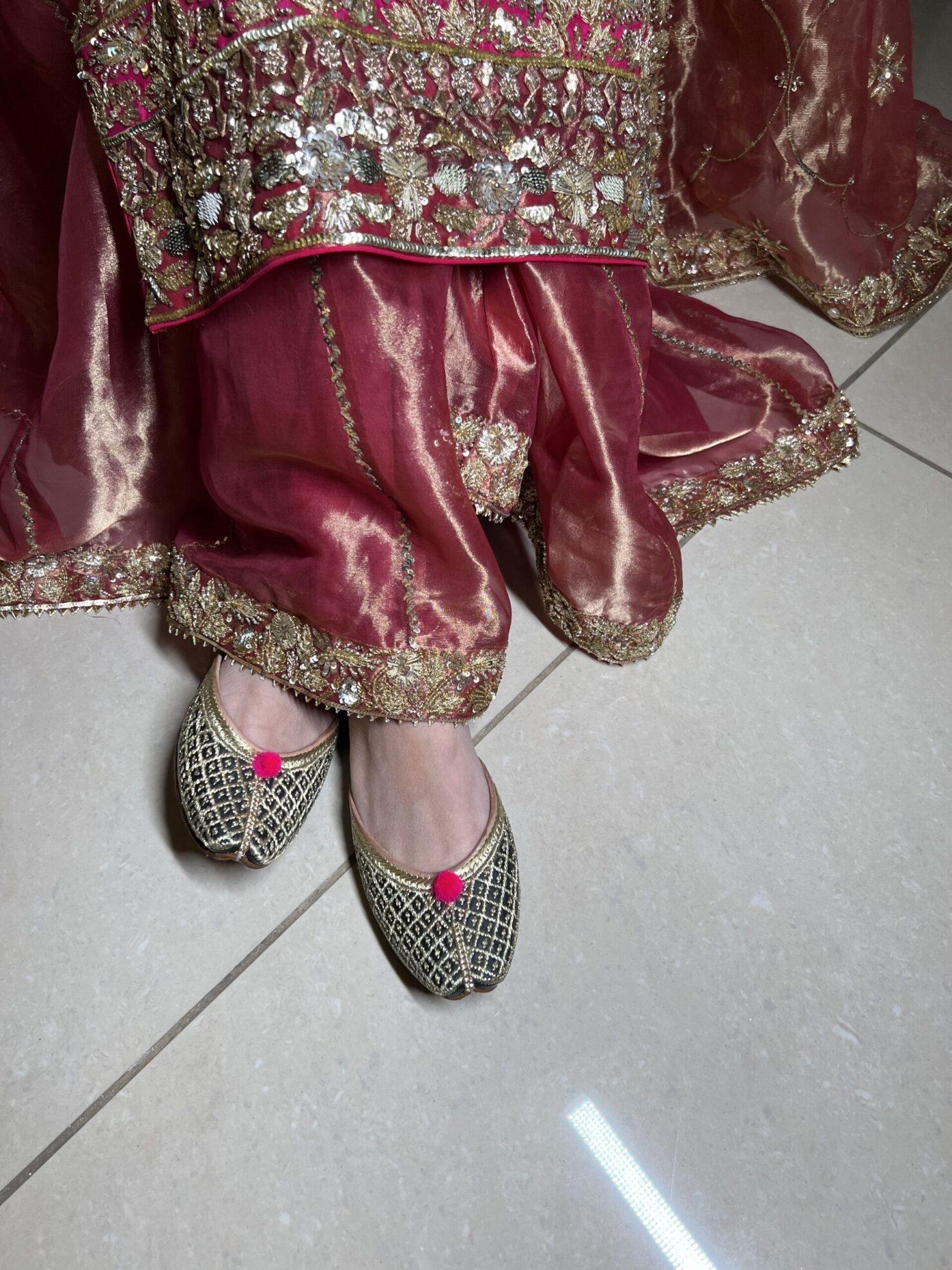 IMG_2444 black base golden tilla hand work punjabi jutti for women diamond design