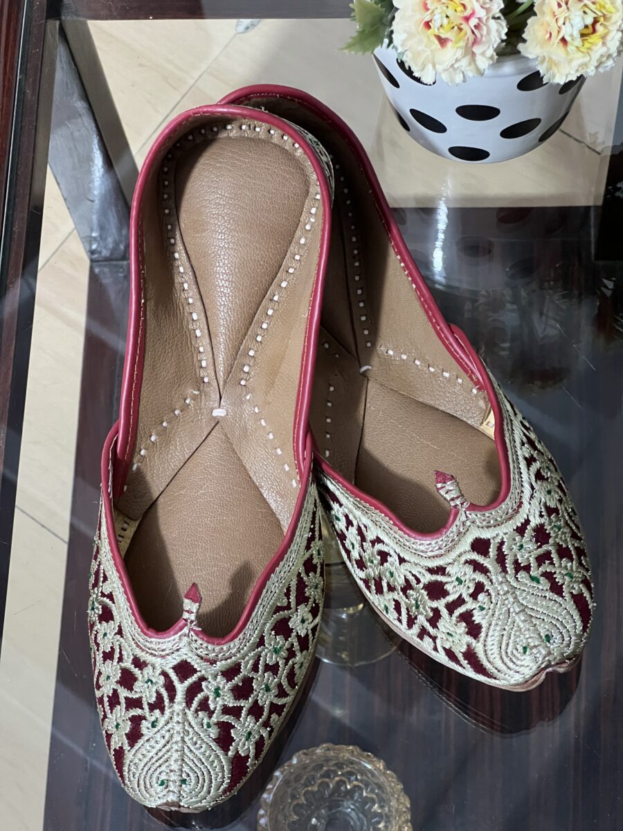 Maroon base light golden tilla hand work punjabi jutti for women