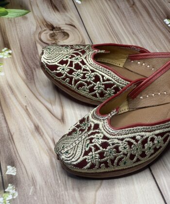 Maroon base light golden tilla hand work punjabi jutti for women