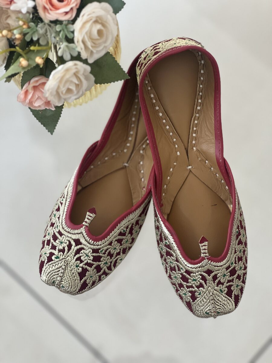 Maroon base light golden tilla hand work punjabi jutti for women