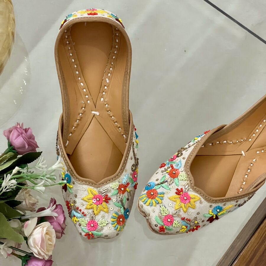 Cream Base multi colour hand embroidered Punjabi jutti for ladies, girls and women. Trending design, Zardosi work, double cushioned for full day comfort, pure leather handmade punjabi jutti