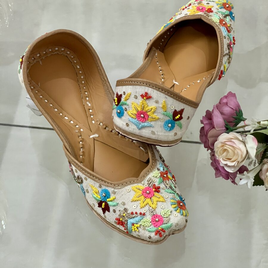 Cream Base multi colour hand embroidered Punjabi jutti for ladies, girls and women. Trending design, Zardosi work, double cushioned for full day comfort, pure leather handmade punjabi jutti