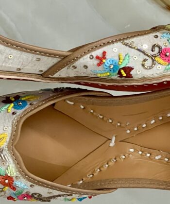 Cream Base multi colour hand embroidered Punjabi jutti for ladies, girls and women. Trending design, Zardosi work, double cushioned for full day comfort, pure leather handmade punjabi jutti