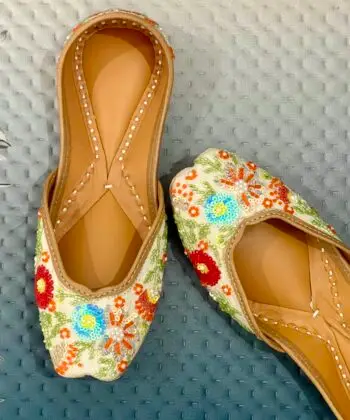 Cream Base multi colour hand embroidered Punjabi jutti for ladies, girls and women. Trending design, Zardosi work, double cushioned for full day comfort, pure leather handmade punjabi jutti
