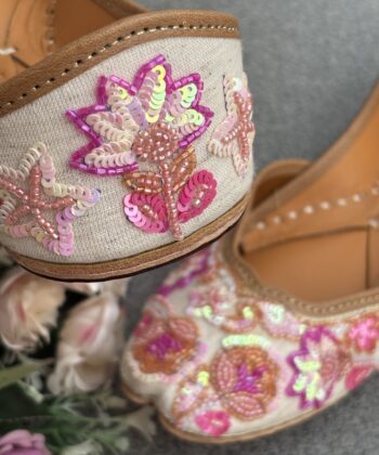 Off white base hand embroidered Punjabi jutti for women, zardosi work with pearls and sequins, pure leather, double cushioned jutti by sandoori, free shipping, free exchange, latest design, branded jutti, colour pink, magenta, off white