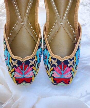Black base hand embroidered multi coloured kashmiri embroidery Punjabi jutti for women, floral design, pure leather, double cushioned jutti by sandoori, free shipping, free exchange, latest design, branded jutti, main colours black, red, pink, maroon, green, brown, blue