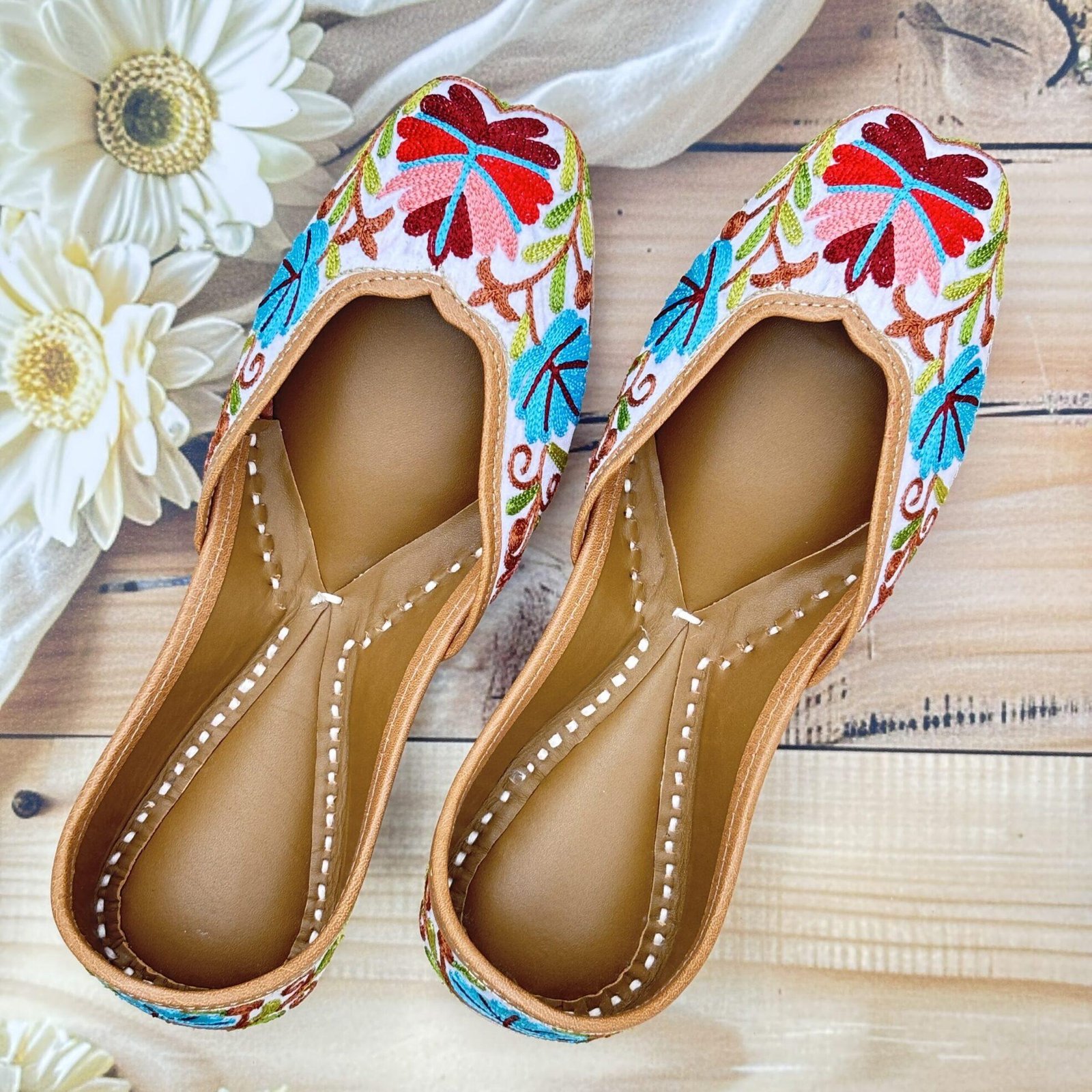 kashmiri-jutti-hand-embroidered White base hand embroidered multi coloured kashmiri embroidery Punjabi jutti for women, floral design, pure leather, double cushioned jutti by sandoori jutti, free shipping, free exchange, latest design, branded jutti, main colours white, red, pink, maroon, green, brown, blue kashmiri-jutti-hand-embroidered