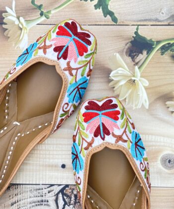 White base hand embroidered multi coloured kashmiri embroidery Punjabi jutti for women, floral design, pure leather, double cushioned jutti by sandoori jutti, free shipping, free exchange, latest design, branded jutti, main colours white, red, pink, maroon, green, brown, blue kashmiri jutti hand embroidered