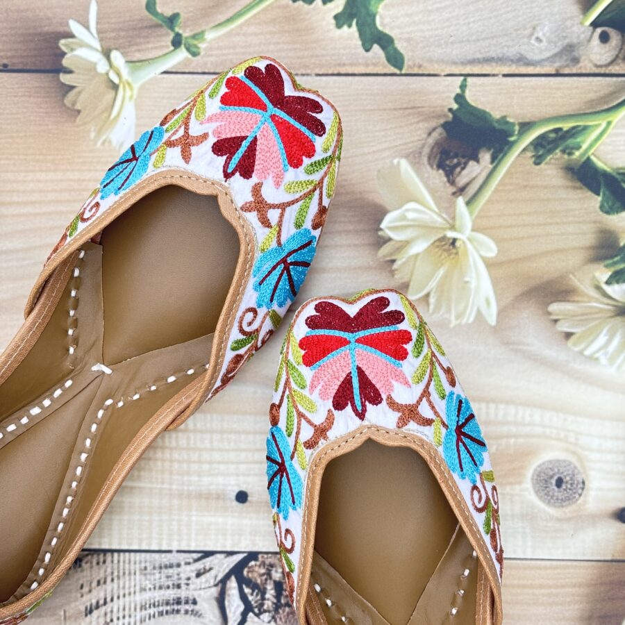 White base hand embroidered multi coloured kashmiri embroidery Punjabi jutti for women, floral design, pure leather, double cushioned jutti by sandoori jutti, free shipping, free exchange, latest design, branded jutti, main colours white, red, pink, maroon, green, brown, blue kashmiri jutti hand embroidered