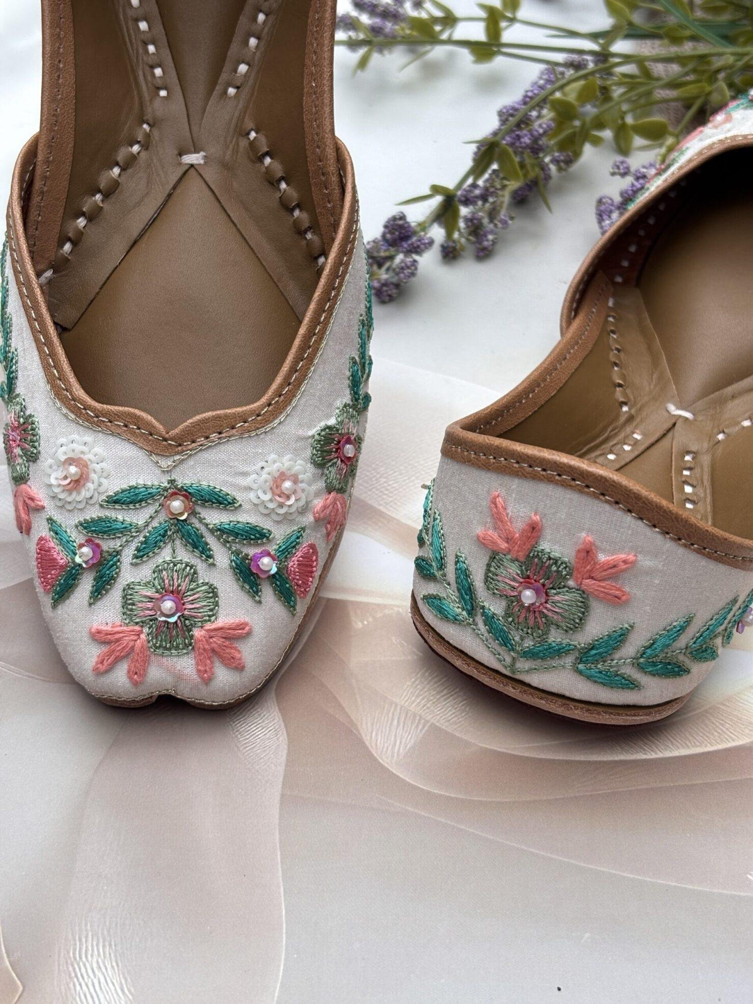 multi-coloured-white-base-jutti2 White base multi coloured hand embroidered Punjabi jutti for women, pure leather, double cushioned jutti by sandoori jutti, free shipping, free exchange, latest design, branded jutti, main colours green, pink, peach, white