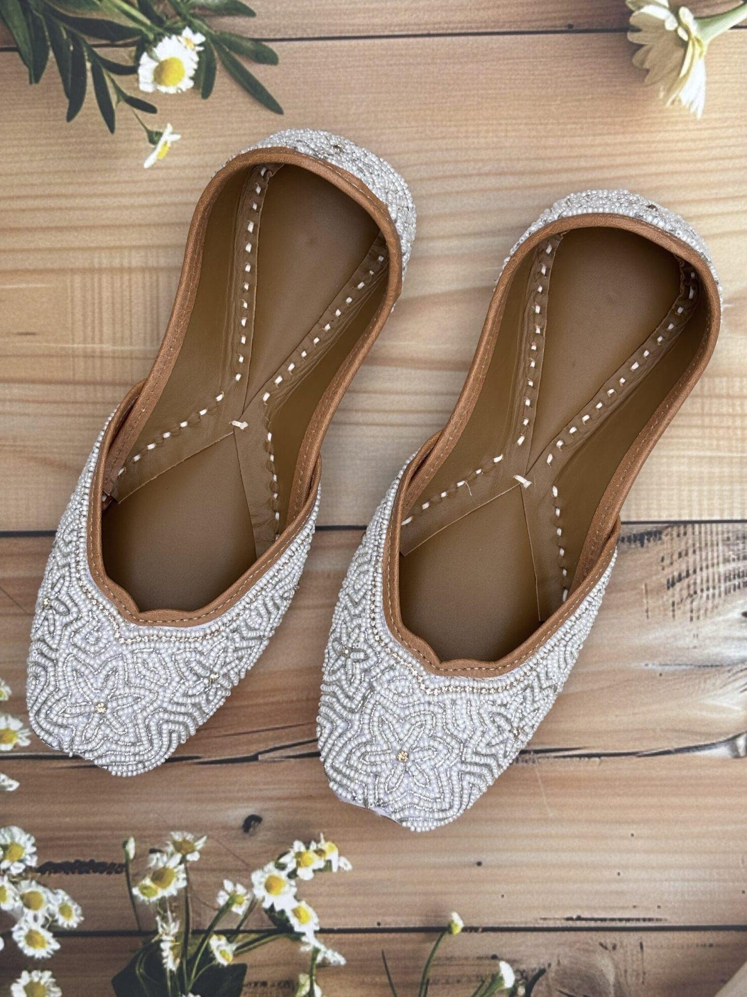 white-jutti3 White base hand embroidered Punjabi jutti for women, star design, pure leather, double cushioned jutti by sandoori jutti, free shipping, free exchange, latest design, branded jutti, main colours white and silver