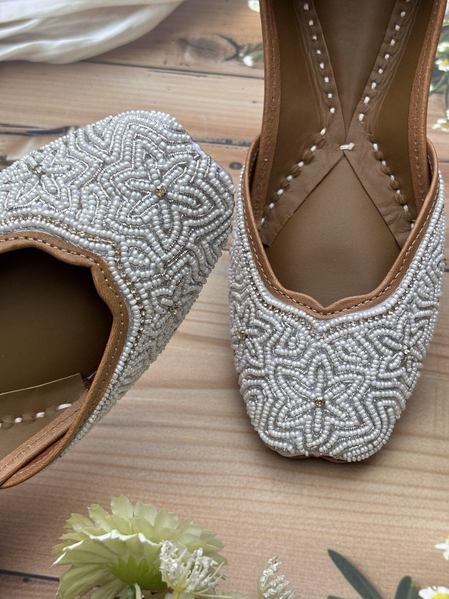 white-jutti2 White base hand embroidered Punjabi jutti for women, star design, pure leather, double cushioned jutti by sandoori jutti, free shipping, free exchange, latest design, branded jutti, main colours white and silver