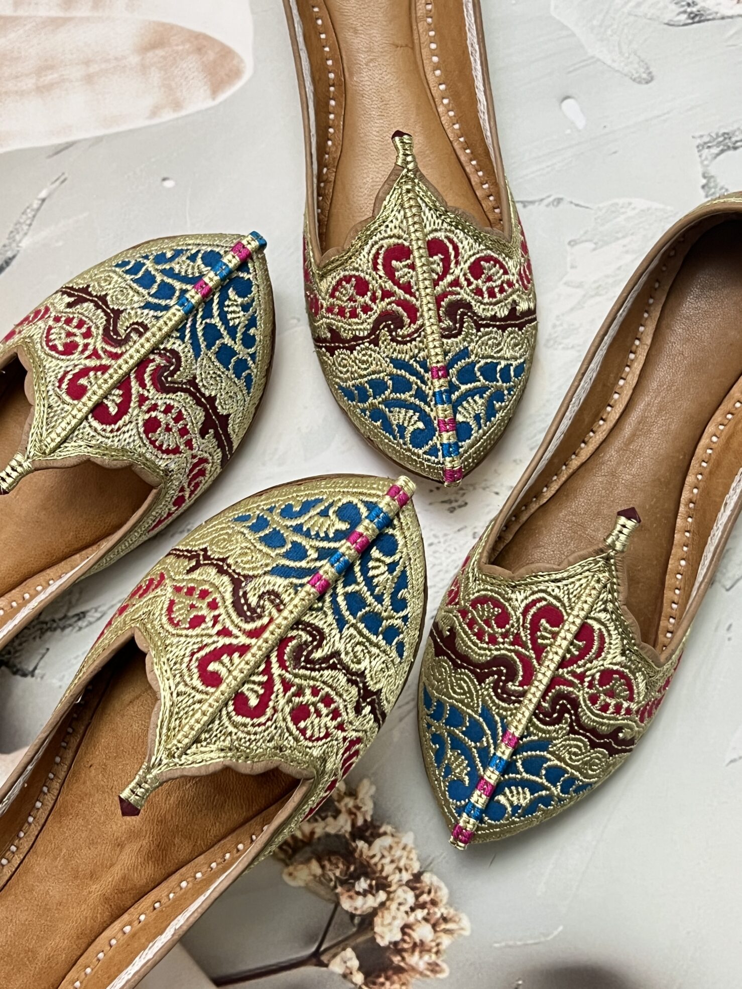 IMG_1293 Biba Jutti with Phirozy and Magenta velvet inserts and hand embroidered with Golden tilla (Zari). A stunning blend of tradition and comfort. Lovingly handcrafted by skilled artisans, this Punjabi jutti, also known as mojari or Delhi fashion jutti