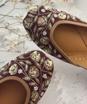 Maroon hand embroidered jutti with golden sequins and pearls